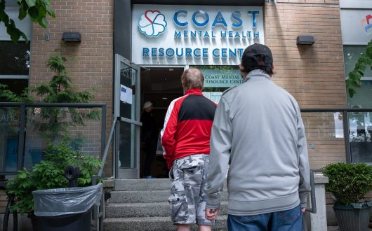 A man approached the Coast Mental Health building door