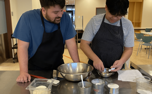 Alexis and Joshua preparing the recipe